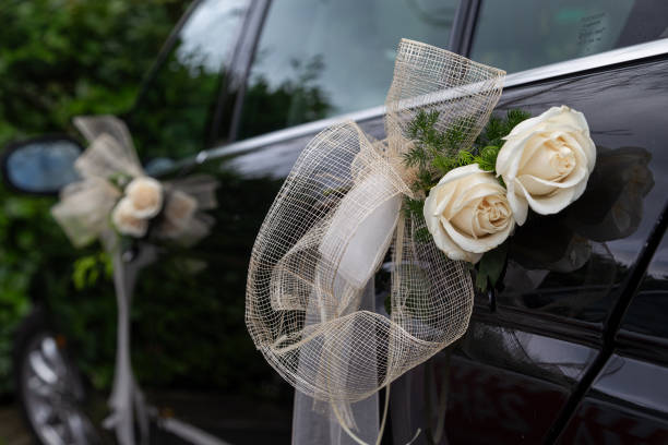 Wedding black car decorated with white roses - Westchester County Limo New York